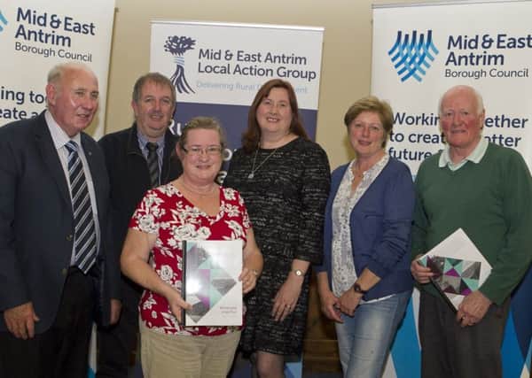 Alderman Maureen Morrow (Mid & East Antrim Council), pictured at the Village Plans Celebratory Event in Larne Town Hall along with representatives from Whitehead.  INCT 45-720-CON