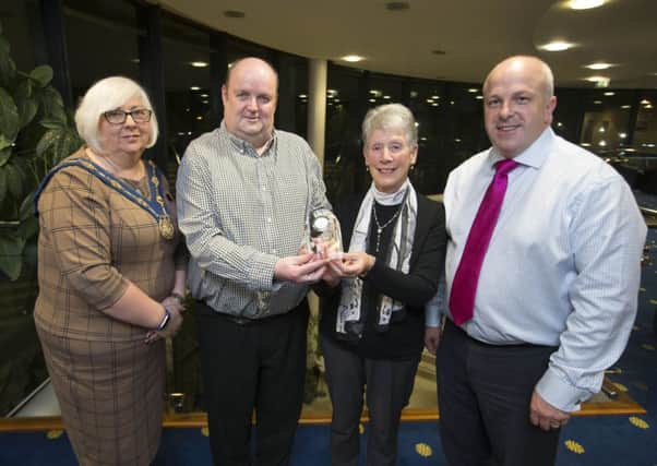 Pictured at the reception to recognise the volunteers of Lisburn Gateway Club are: (l-r) Deputy Mayor, Councillor Hazel Legge; Stephen Lenaghan and Kate Price of Lisburn Gateway Club and Alderman James Tinsley, Chairman of the council's Lesiure & Community Development Commitee.