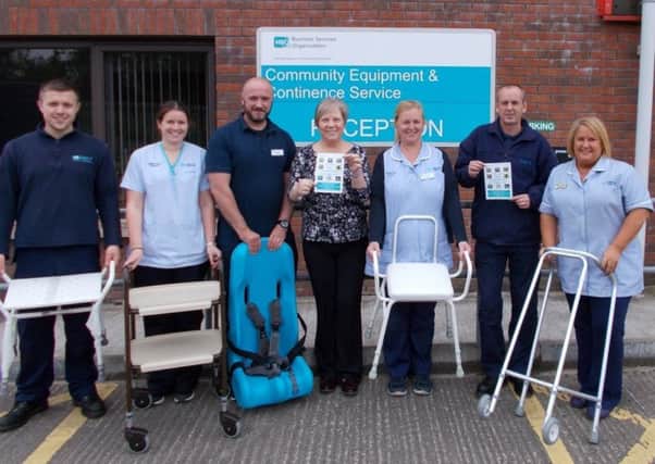 Staff from the Trust's equipment service showing the sort of aids they would like returned.