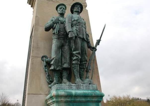 The war memorial before cleaning was carried out.