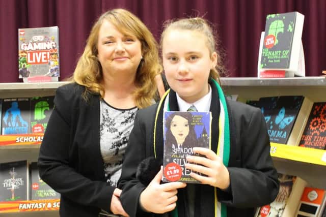 Eireann Gallagher with mum Deirdre  at the St Patrick's Academy coffee morning and book fair