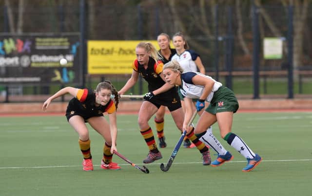 Robyn McKee, Queen's battles with Lauren Wright and Emma Lindsay, Lurgan in last year's final.