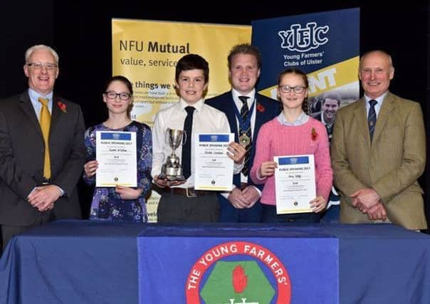 David Cairns, Agency Development Manager from sponsor NFU Mutual is pictured with the winners of the 12-14 category at the YFCU Public Speaking Finals. (L-R) Rachel McCollum, Coleraine YFC; Allister Crawford, Seskinore YFC and Amy Gregg, Glarryford YFC. Also pictured, YFCU President James Speers and Guest Speaker Cyril Millar.