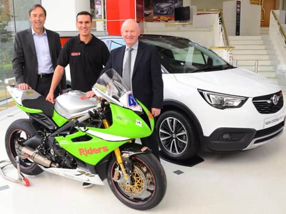 Announcing Vauxhall's sixth year as title sponsor of the International North West 200 are Simon Oldfield, Vauxhall's Marketing Director, Martin Jessopp, NW200 Supersport and Supertwins race winner and Event Director, Mervyn Whyte.