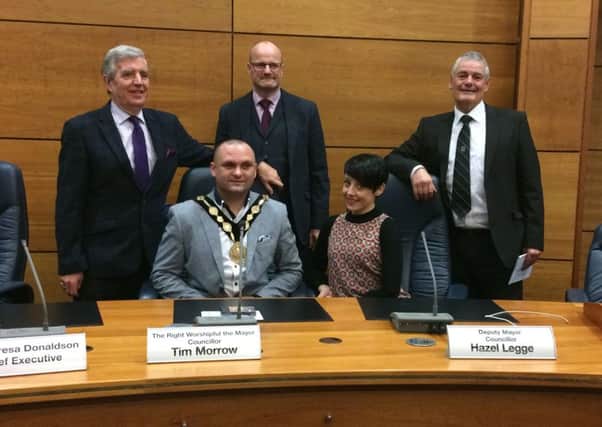 Allister Brown (seated left wearing the Mayor's chain) is pictured at the reception with his father Nigel, sister Christine, Councillor Tim Mitchell and Mayor Tim Morrow.